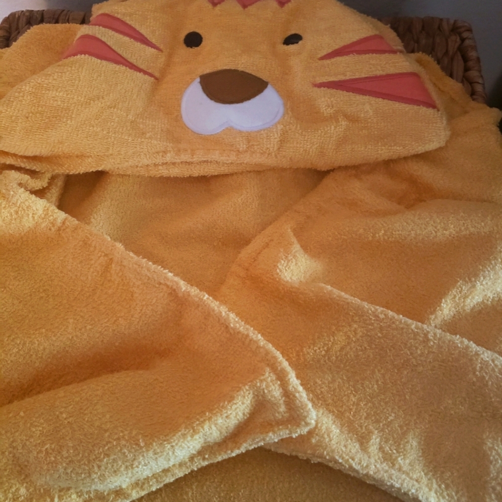 Main Stay size a lion towel color orange